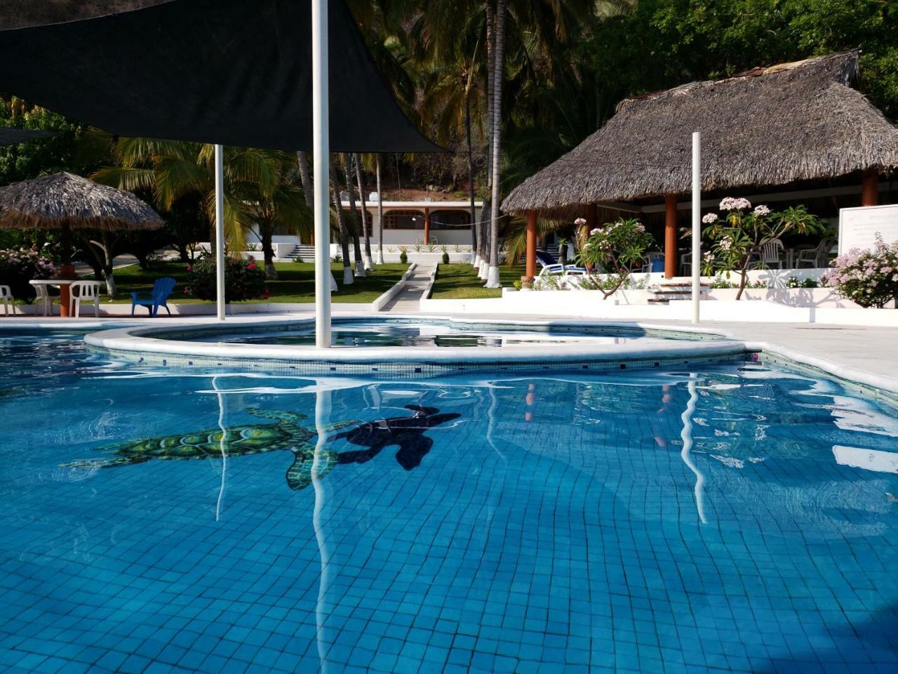 Hotel Y Club Campestre Altos Paraiso ปูแอร์โตเอสกอนดิโด ภายนอก รูปภาพ